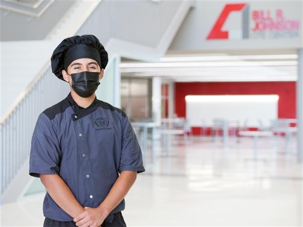 Javier in chef's hat at CTE Center